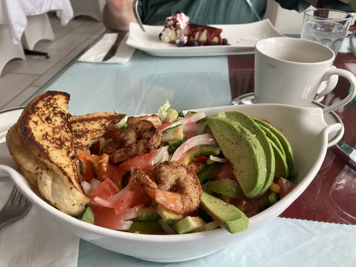 Shrimp and avocado salad with toast